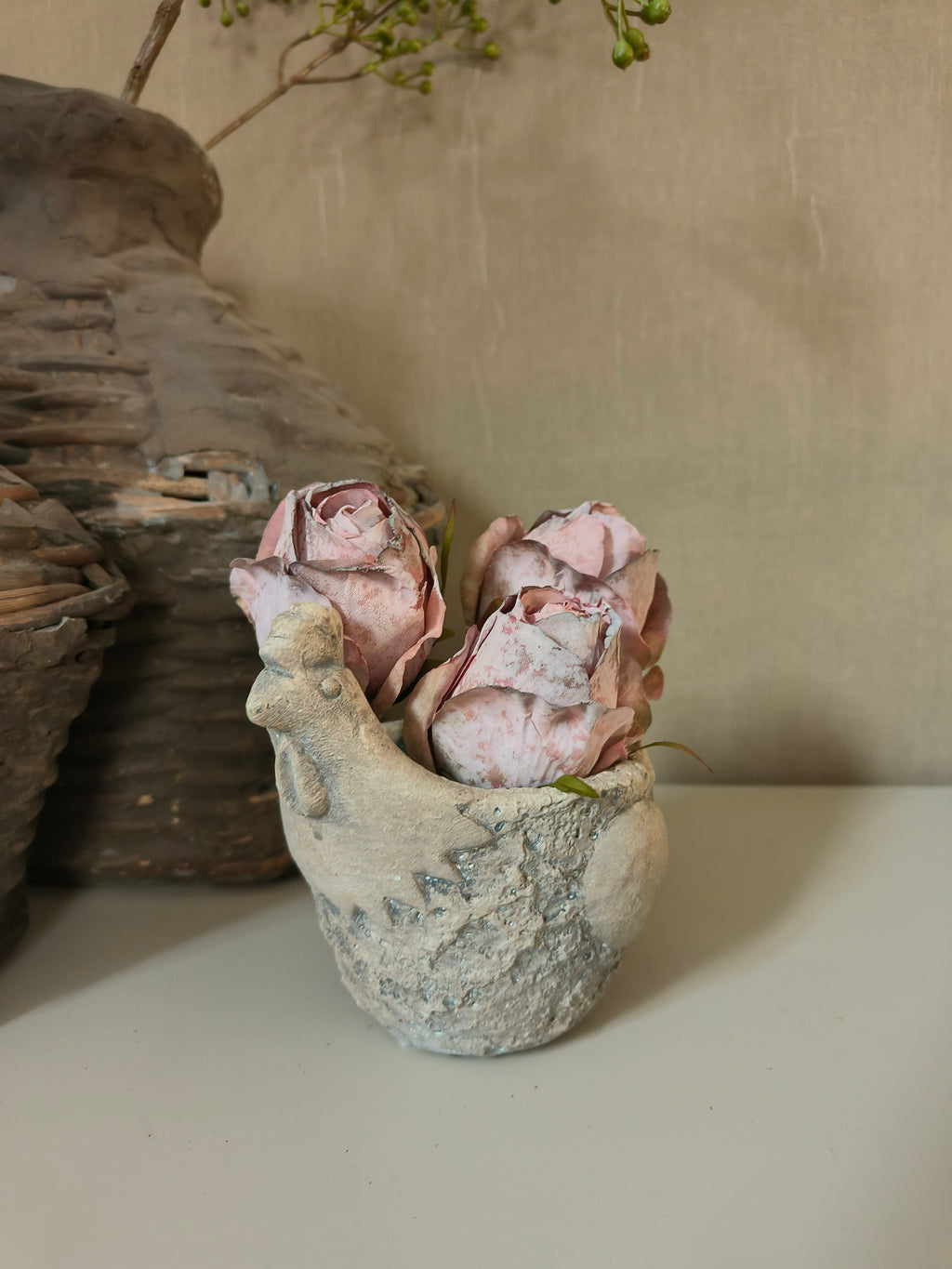 Betonnen kip bloembak