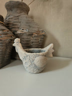 Betonnen kip bloembak